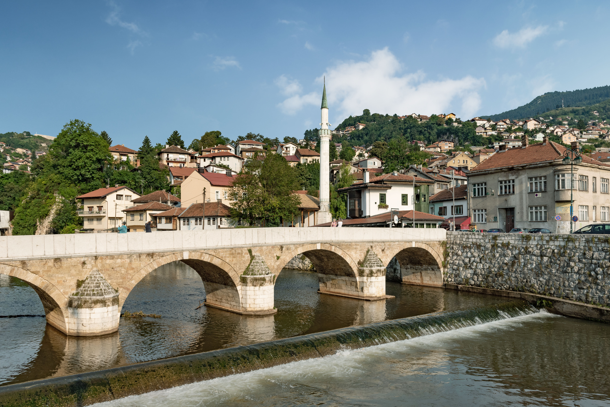 Photograph of Seher-Cehajina Bridge on Miljacka River in the old Town of Sarajevo, capital city of Bosnia and Herzegovina.