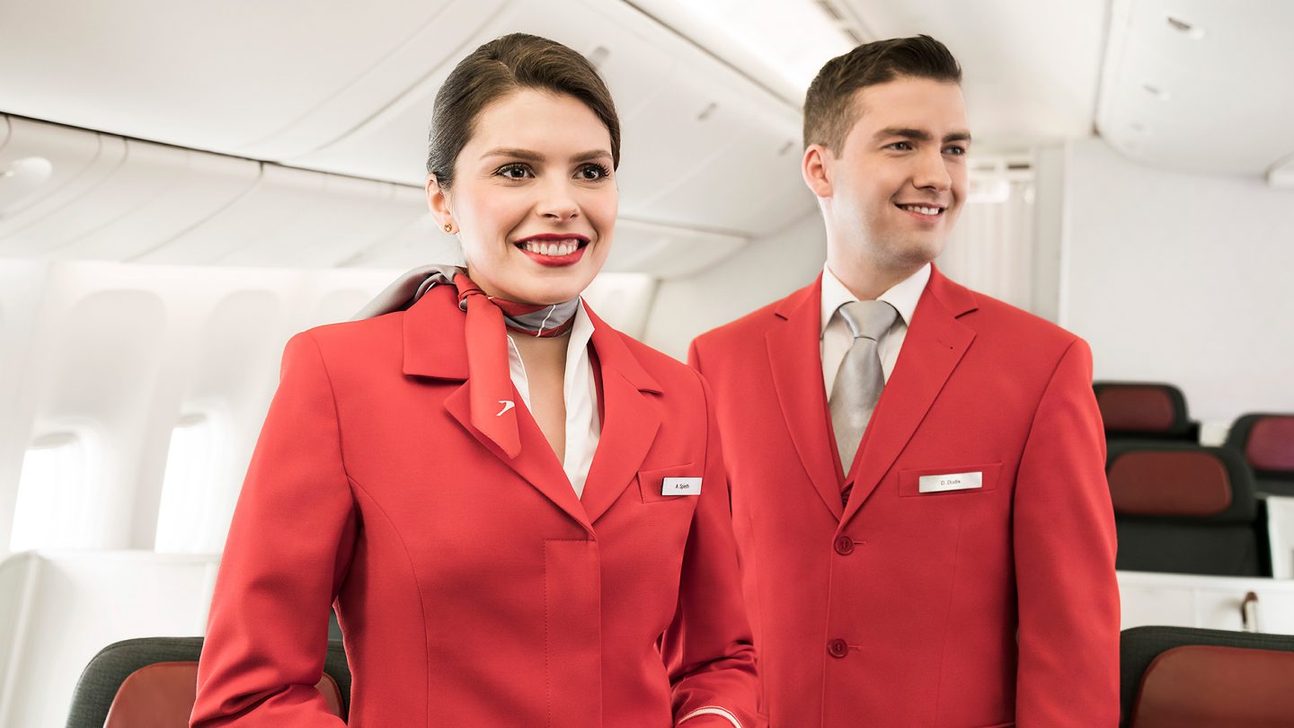 Two young Austrian flight attendants on the airplane