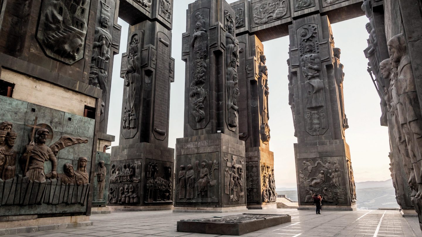 Tbilisi, Georgia - June 23, 2013: People visit the Chronicle of Georgia (Stonehenge) in Tbilisi, Georgia, on the summer evening.